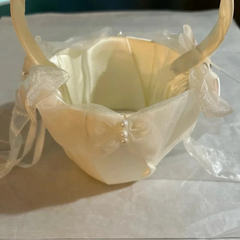 Ivory flower girl basket with satin/sheer bows New With Small Stain (pictured)